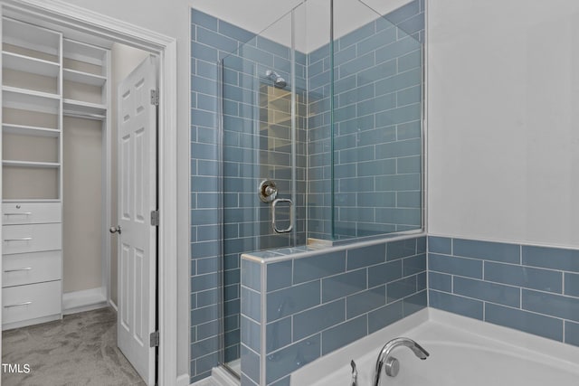 bathroom with shower with separate bathtub