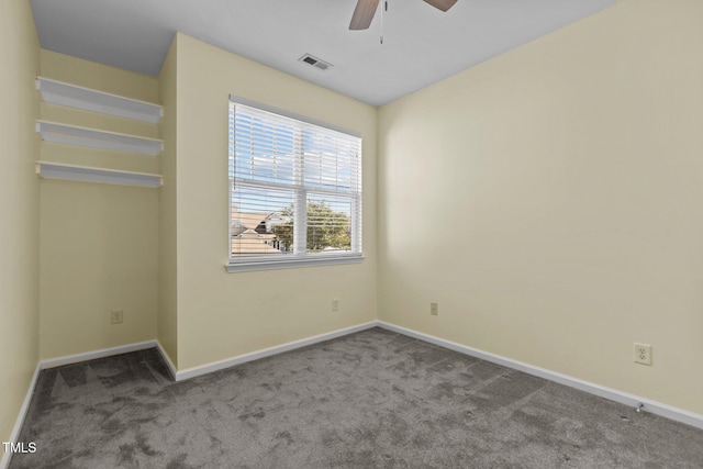 carpeted empty room with ceiling fan