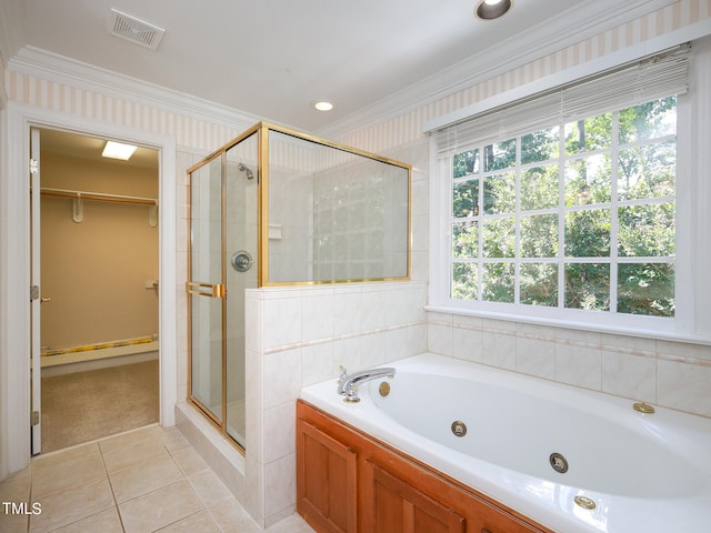 bathroom featuring separate shower and tub, crown molding, and tile patterned flooring