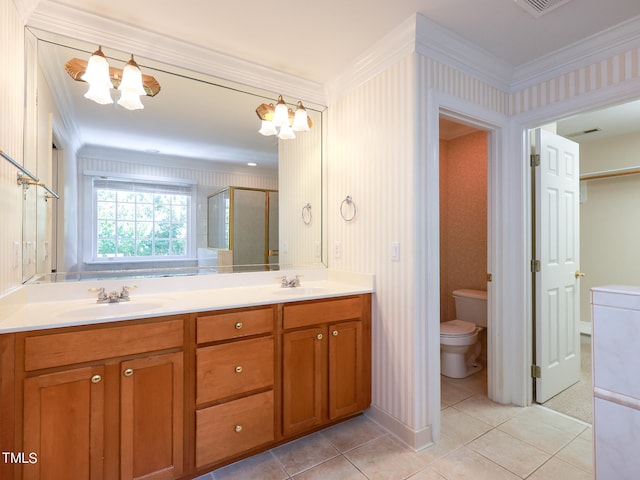 bathroom featuring a shower with shower door, toilet, ornamental molding, and an inviting chandelier