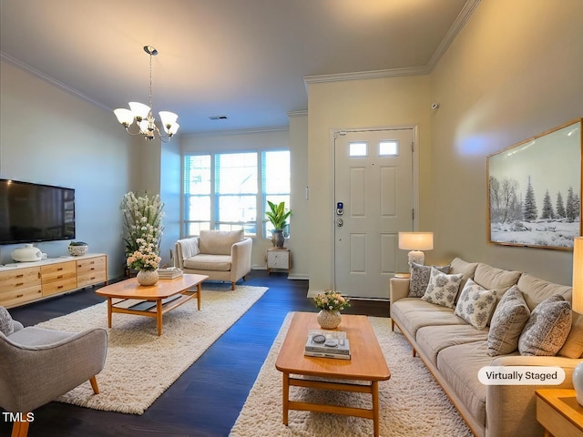 living room with a chandelier, dark hardwood / wood-style flooring, and crown molding