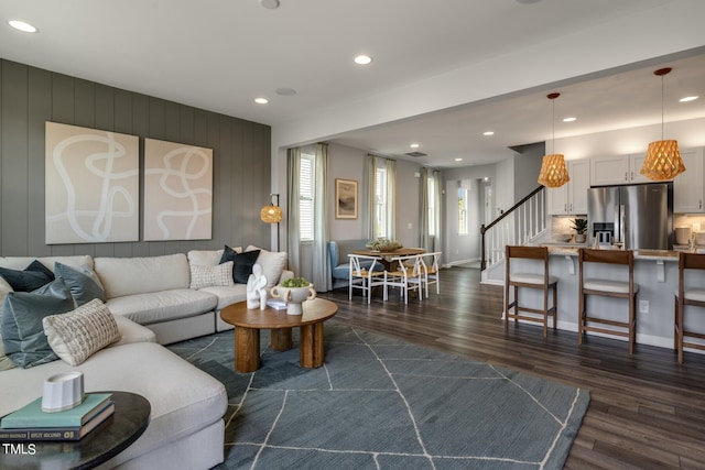 living room featuring dark hardwood / wood-style floors