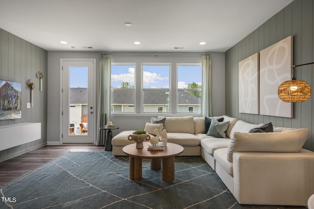 living room with dark wood-type flooring