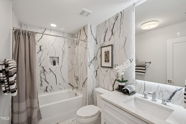 full bathroom featuring shower / tub combo with curtain, vanity, and toilet