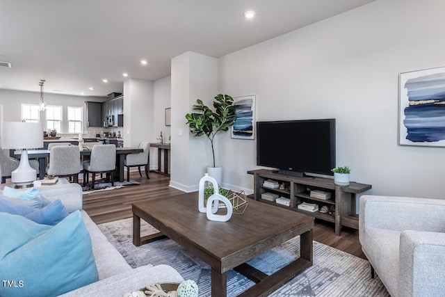 living room with hardwood / wood-style floors