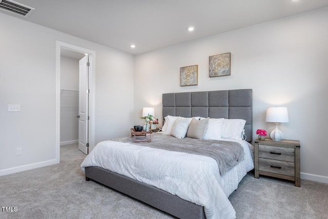 1206 Holding Village Way, Wake Forest, NC 27587 - bedroom with carpet, recessed lighting, baseboards, and a walk in closet