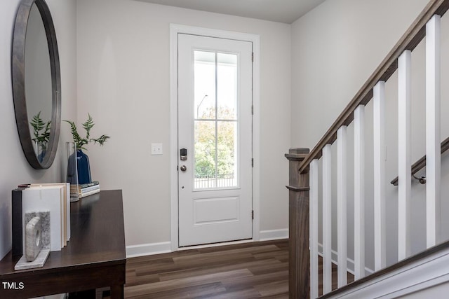1206 Holding Village Way, Wake Forest, NC 27587 - foyer with wood finished floors, stairway, and baseboards