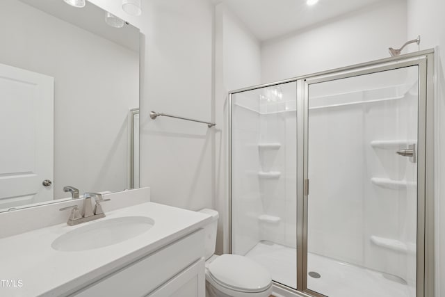 1206 Holding Village Way, Wake Forest, NC 27587 - bathroom featuring a stall shower, vanity, and toilet