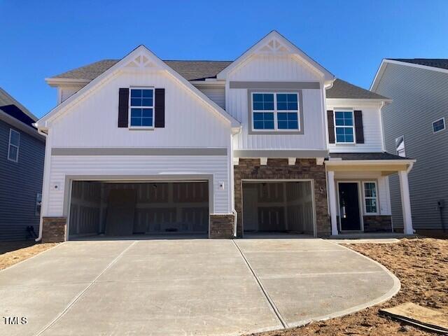 craftsman-style home with a garage