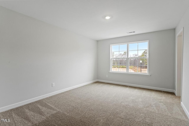 unfurnished room with carpet