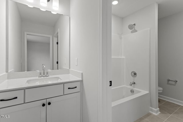 full bathroom with shower / bath combination, tile patterned flooring, vanity, and toilet