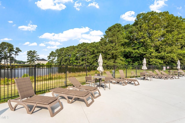 view of patio featuring a water view