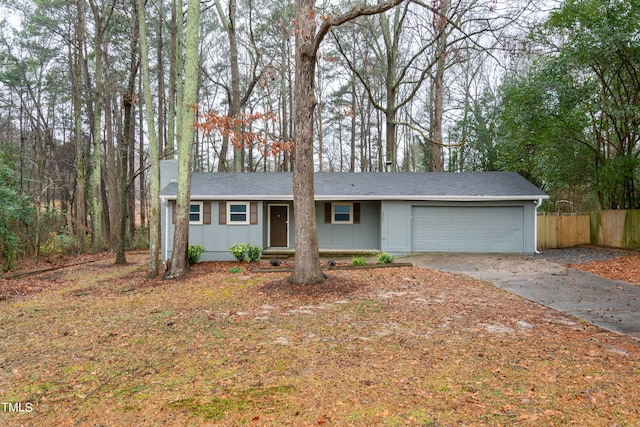 single story home featuring a garage