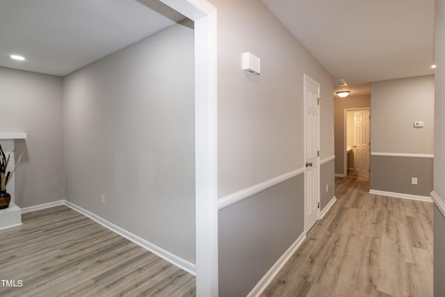 hallway featuring light wood-type flooring