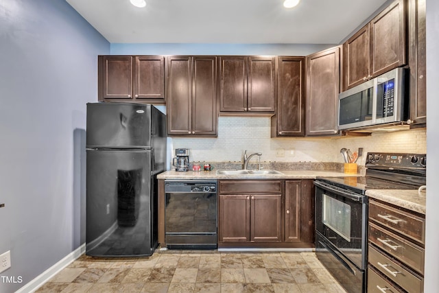 kitchen featuring backsplash, black appliances, sink, light stone countertops, and dark brown cabinetry