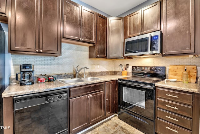 kitchen with decorative backsplash, sink, black appliances, and dark brown cabinets