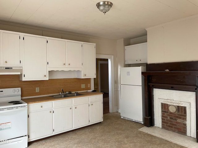 kitchen with exhaust hood, white cabinets, white appliances, sink, and crown molding