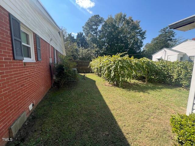 view of yard featuring fence