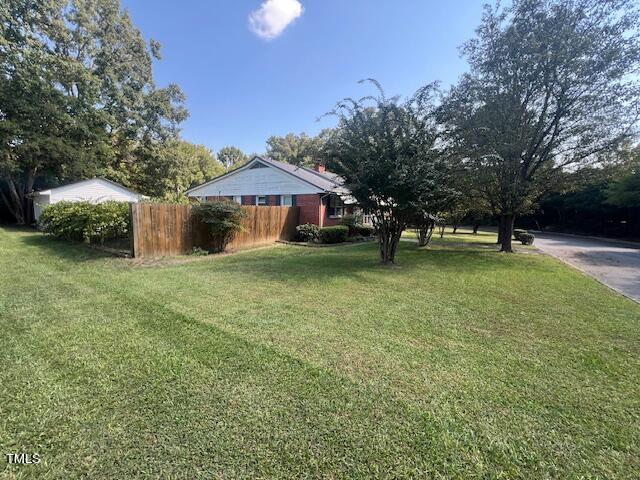 view of yard featuring fence