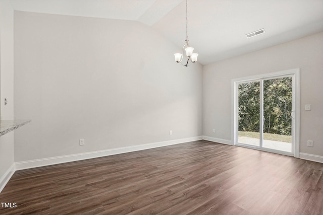 unfurnished room with dark wood-type flooring, visible vents, baseboards, vaulted ceiling, and an inviting chandelier