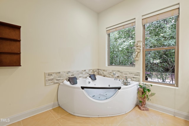 bathroom featuring a bathtub and tile patterned floors