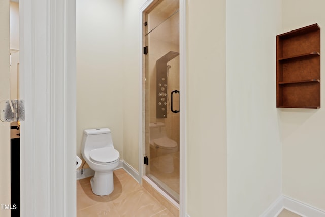 bathroom with walk in shower and toilet