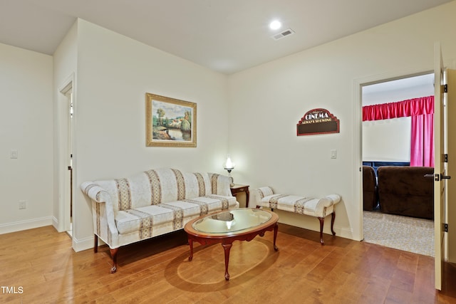 living room with hardwood / wood-style flooring