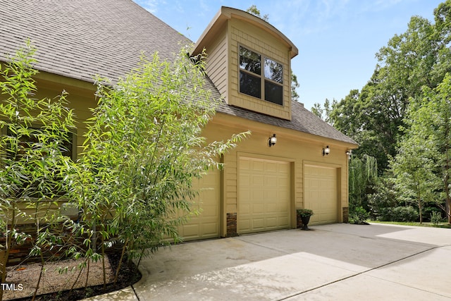 view of home's exterior with a garage