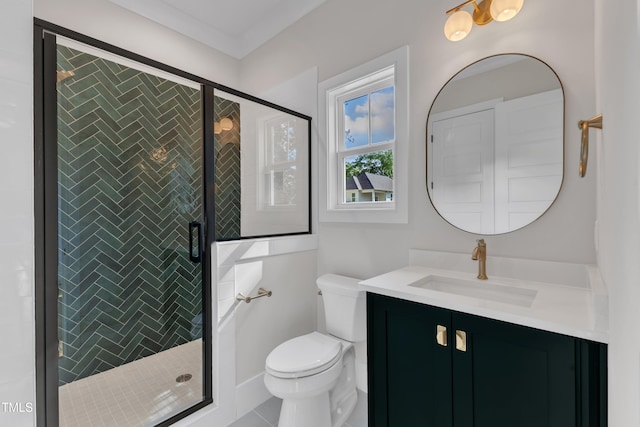 bathroom featuring tile patterned floors, toilet, a shower stall, and vanity