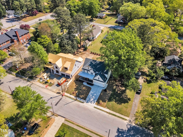 birds eye view of property with a residential view