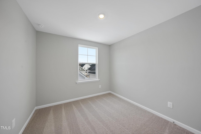 empty room featuring carpet floors