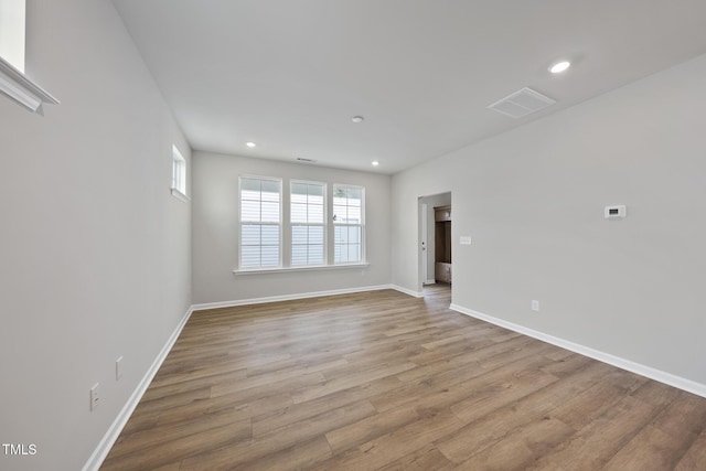 spare room with light wood-type flooring