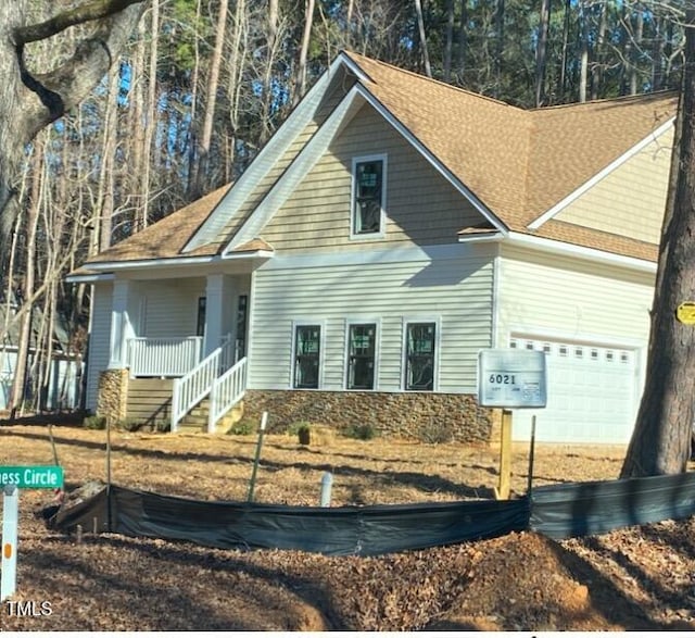 view of front of home with a garage