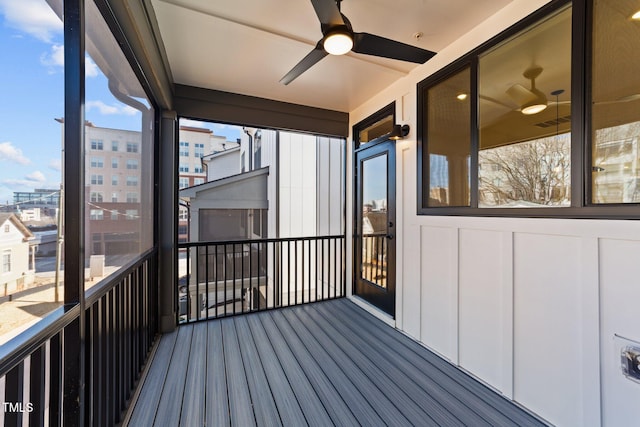 wooden deck with ceiling fan