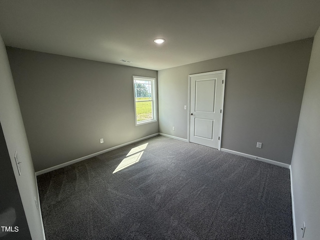 95 Grace Ridge Ct, Benson, NC 27504 - unfurnished bedroom featuring recessed lighting, baseboards, and dark carpet