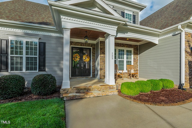 property entrance with covered porch