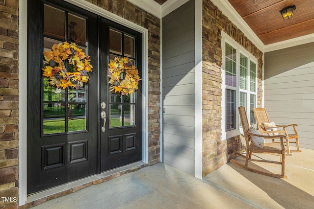 doorway to property with a porch