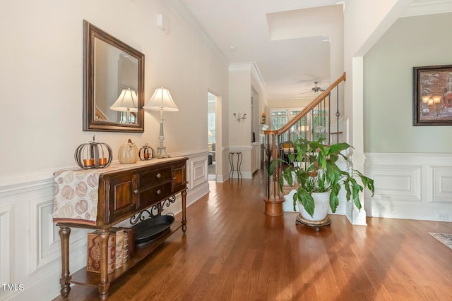 hallway featuring crown molding and hardwood / wood-style flooring