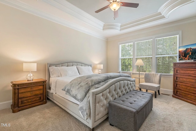 bedroom with crown molding, a raised ceiling, light carpet, and ceiling fan