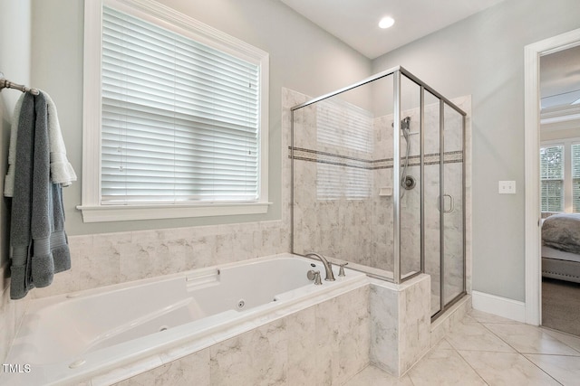 bathroom featuring separate shower and tub and tile patterned floors