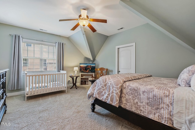 carpeted bedroom featuring ceiling fan and lofted ceiling