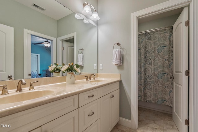 bathroom with vanity, tile patterned floors, a shower with shower curtain, and ceiling fan