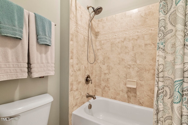 bathroom featuring toilet and shower / bath combo