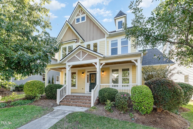 view of front of property featuring covered porch