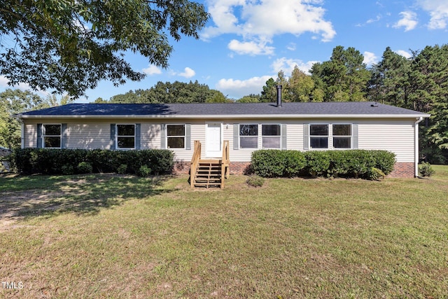 ranch-style home with a front lawn