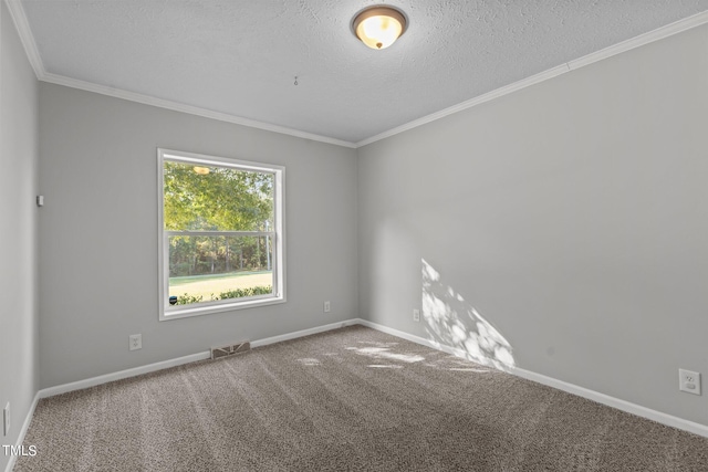 carpeted spare room with a textured ceiling and ornamental molding