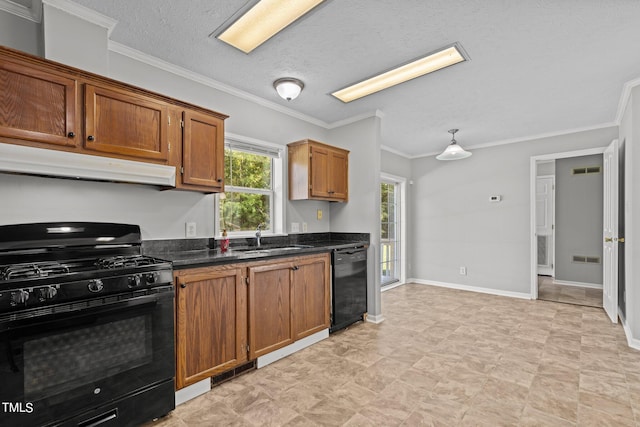 kitchen with a textured ceiling, sink, black appliances, crown molding, and dark stone countertops