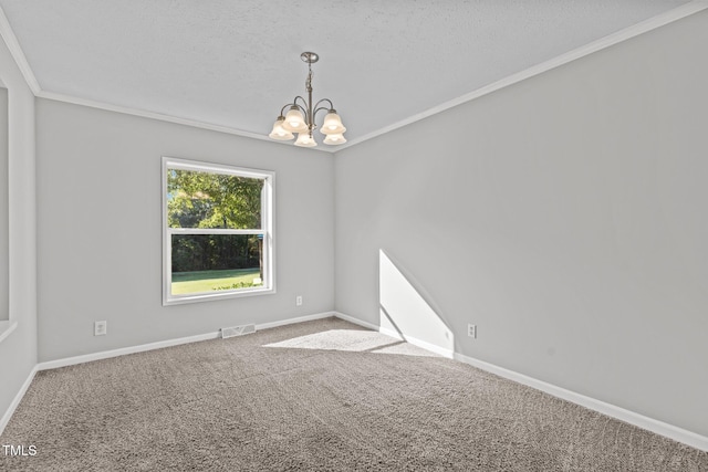 unfurnished room featuring ornamental molding, a chandelier, a textured ceiling, and carpet flooring