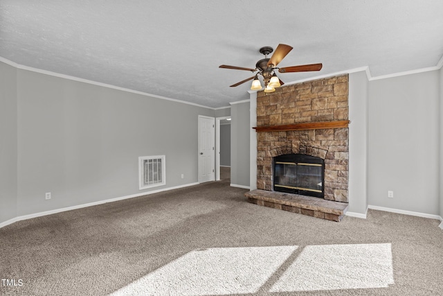 unfurnished living room with a textured ceiling, ceiling fan, carpet flooring, and a stone fireplace