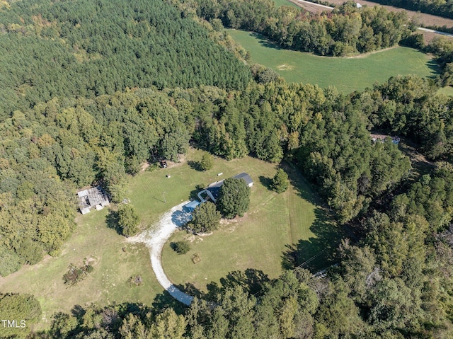 birds eye view of property with a rural view